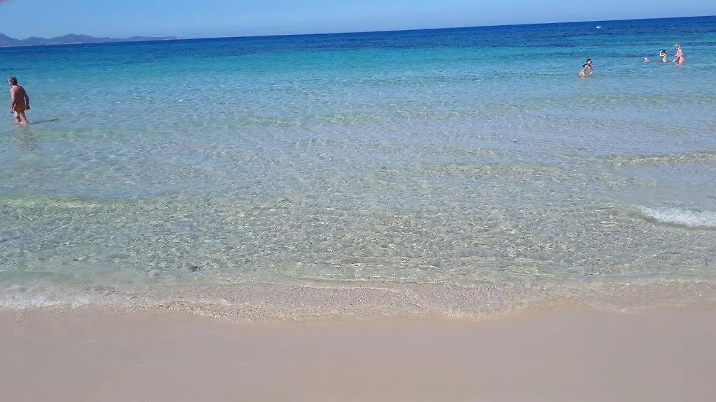 Brezza di mare appartamento in Villa con giardino e spiaggia ,casa vacanze al mare Quartu SantʼElena