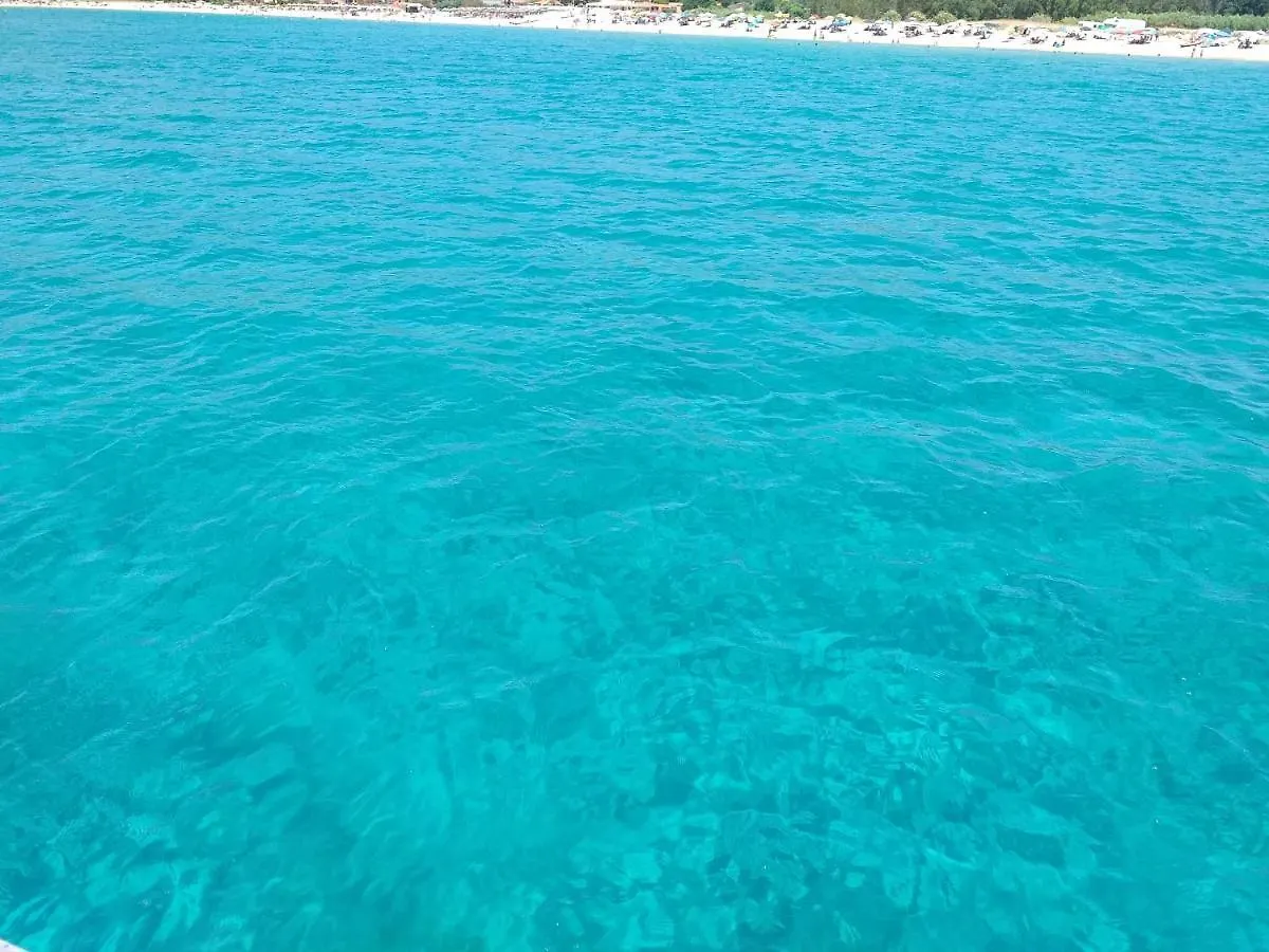 Brezza di mare appartamento in Villa con giardino e spiaggia ,casa vacanze al mare Quartu SantʼElena
